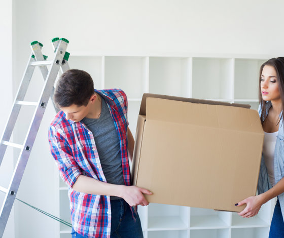 A Couple With Boxes Moves To A New House Property 2023 01 27 04 10 47 Utc